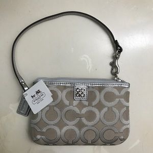 Coach wristlet.